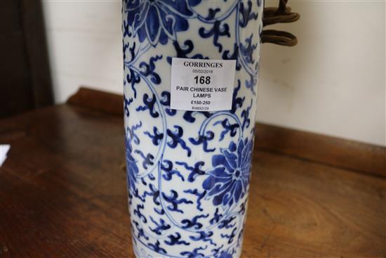 A pair of Chinese blue and white vases, mounted as lamps